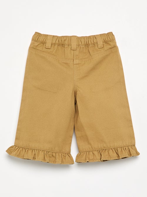 Calças lisas com folho na bainha - Kiabi Calças lisas com folho na bainha - Kiabi