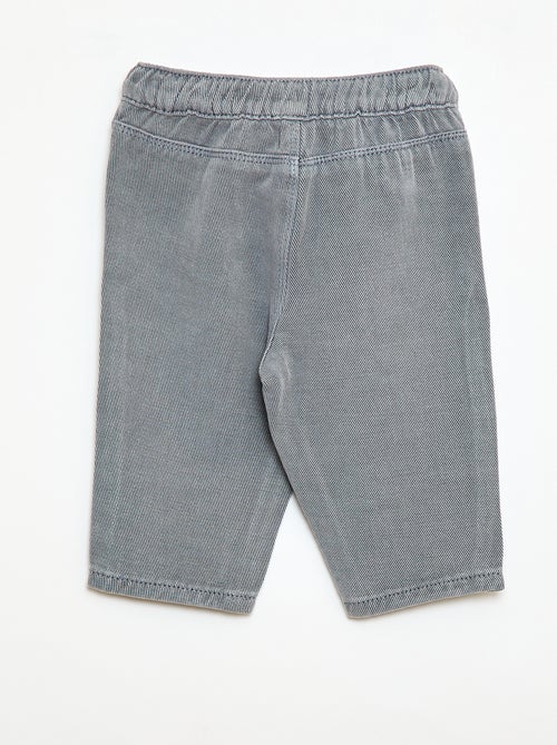 Calças lisas de material suave corte relax fit - Kiabi
