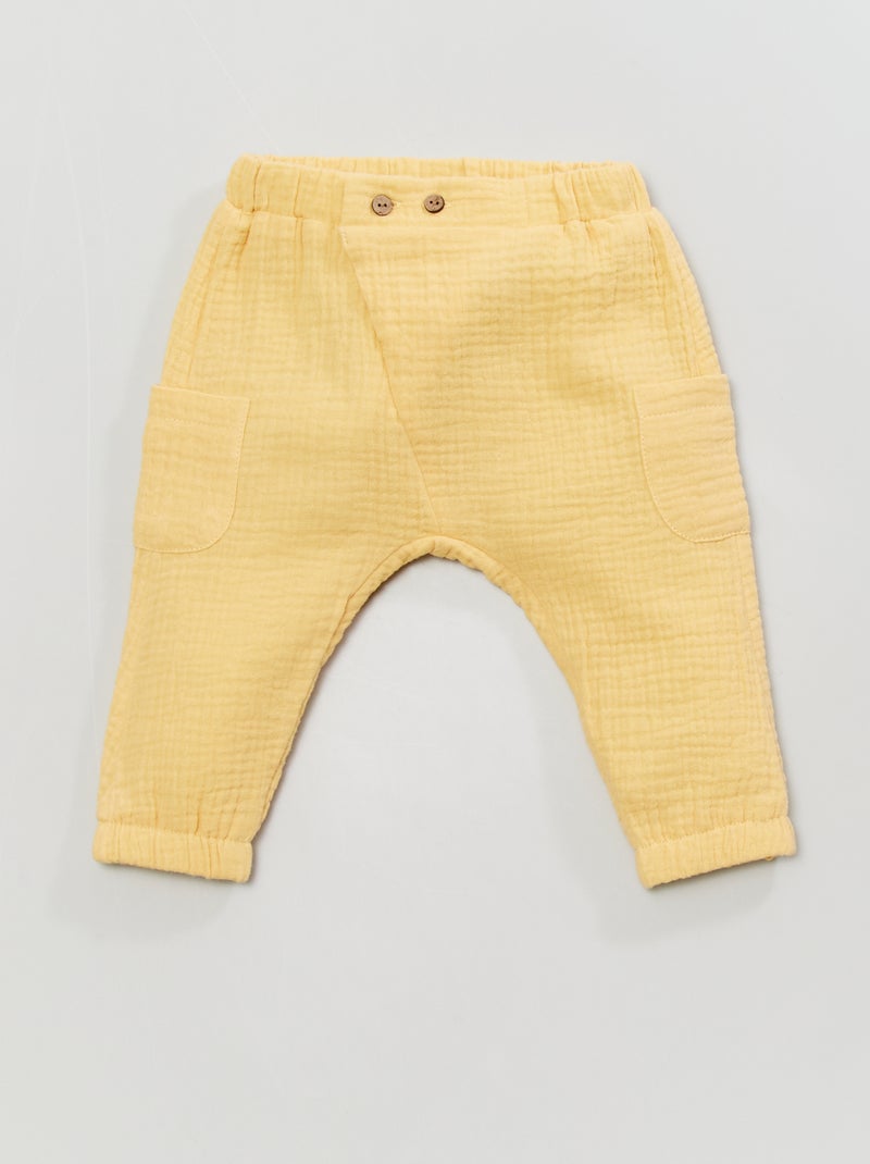 Calças lisas em tecido Amarelo - Kiabi