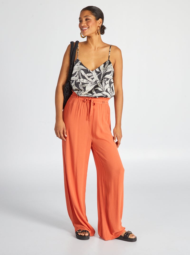 Calças loose em malha crepe Laranja - Kiabi