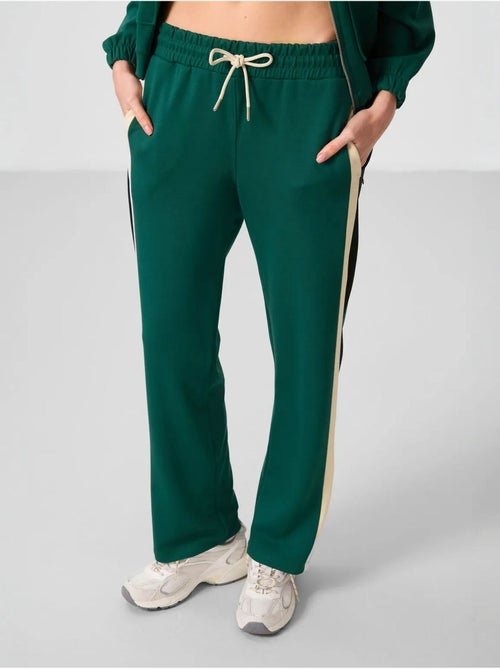 Calças palazzo às riscas com cintura com cordão tommy - Kiabi Calças palazzo às riscas com cintura com cordão tommy - Kiabi