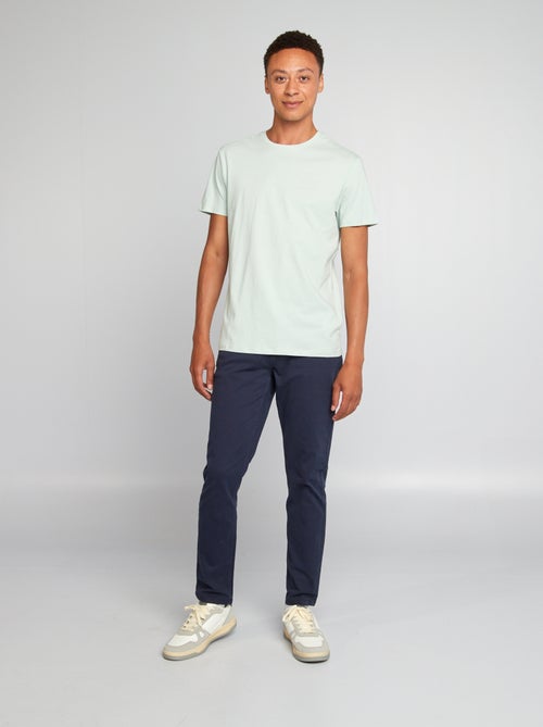 Calças para homem com corte slim e 5 bolsos - Kiabi Calças para homem com corte slim e 5 bolsos - Kiabi