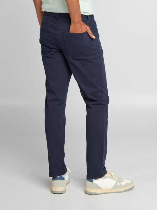 Calças para homem com corte slim e 5 bolsos - Kiabi Calças para homem com corte slim e 5 bolsos - Kiabi