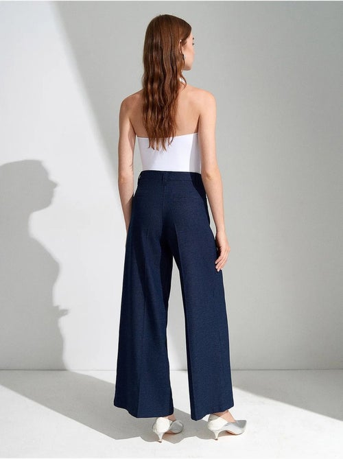 Calças plissadas de cintura alta e perna larga dilvin - Kiabi Calças plissadas de cintura alta e perna larga dilvin - Kiabi