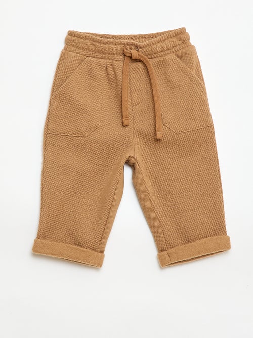 Calças relax em malha piqué - Kiabi