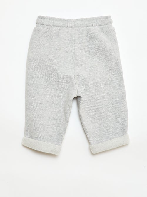 Calças relax em malha piqué - Kiabi