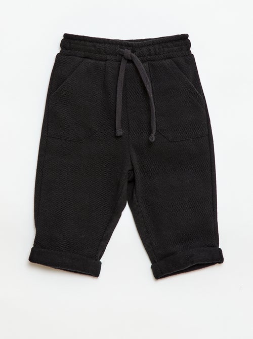 Calças relax em malha piqué - Kiabi