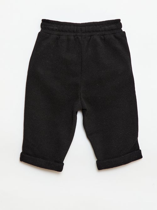 Calças relax em malha piqué - Kiabi