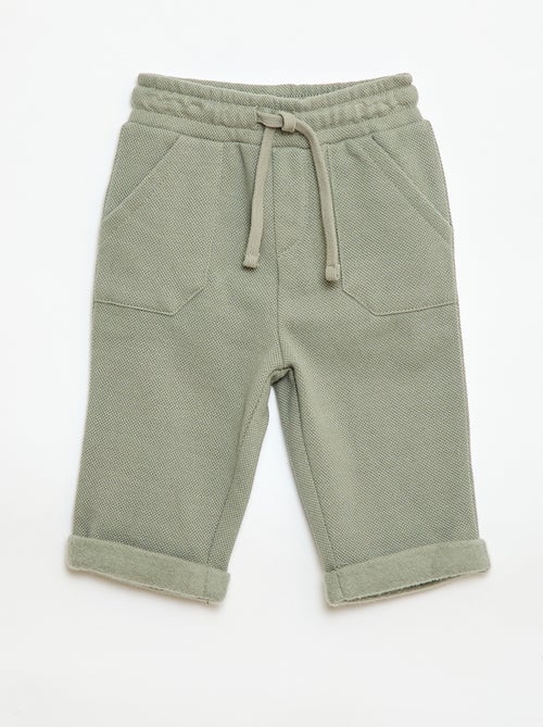 Calças relax em malha piqué - Kiabi