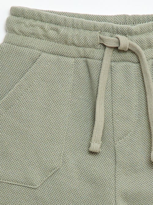 Calças relax em malha piqué - Kiabi