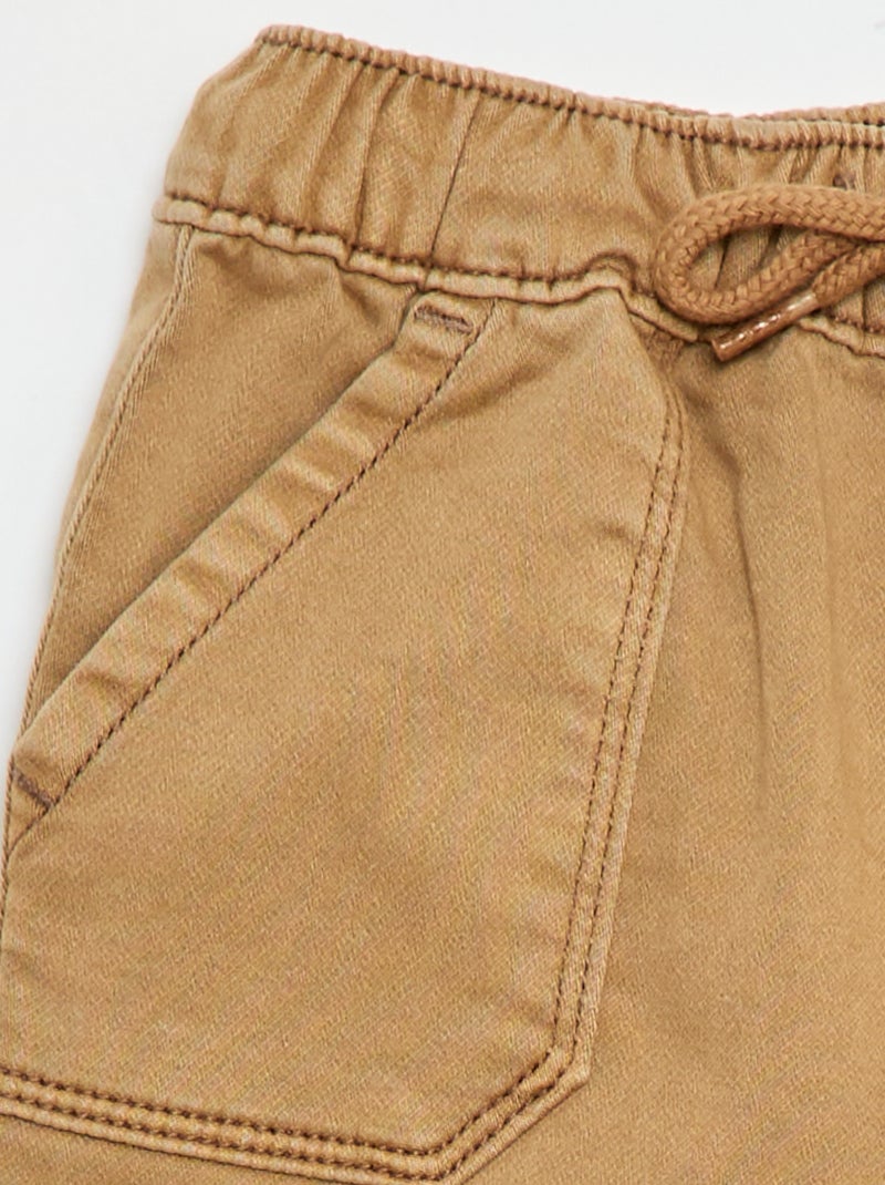 Calças relax fit Bege - Kiabi