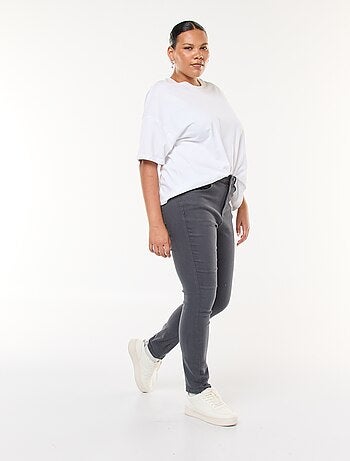 Calças skinny com cintura subida