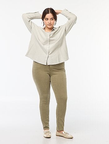 Calças skinny com cintura subida