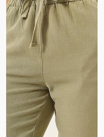 Calças skinny pelo tornozelo com bolsos lucci