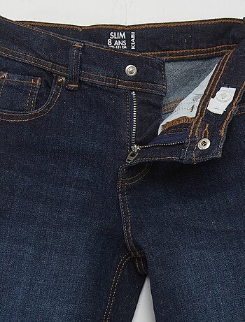 Calças slim com 5 bolsos