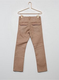 Calças slim com pormenores nos joelhos - Kiabi