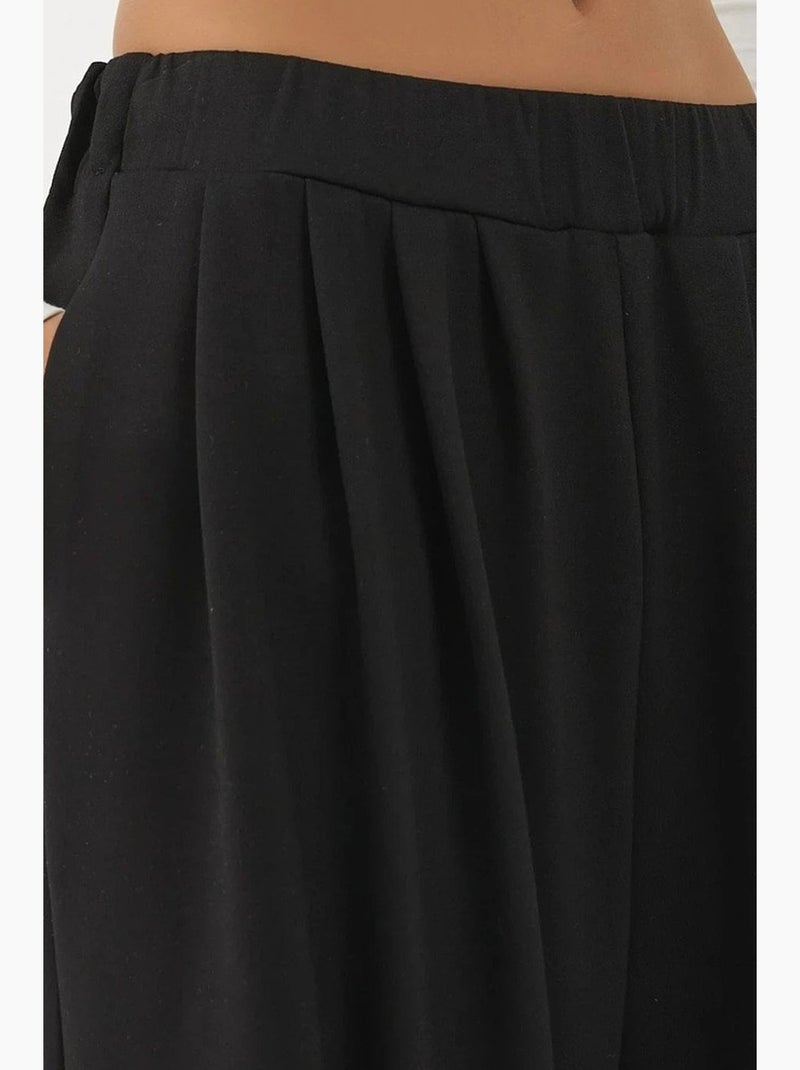 Calças soft touch plissadas de perna larga hiccup Preto - Kiabi