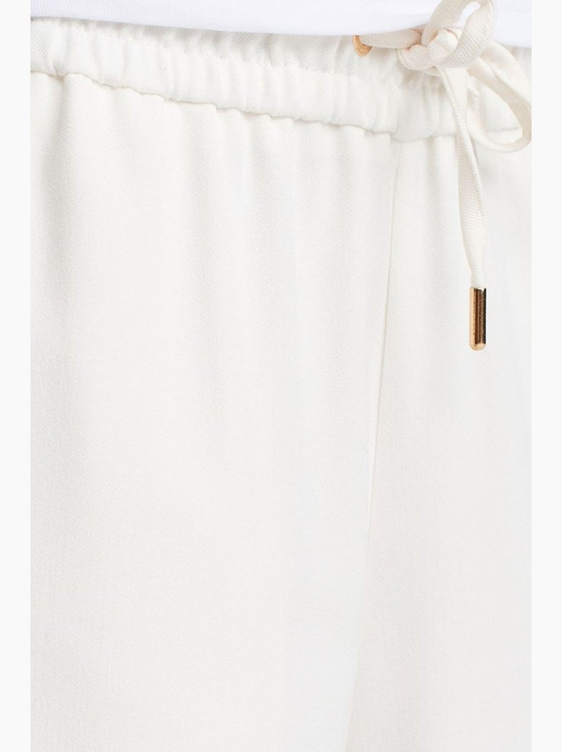 Calças tecidas de perna larga com cintura com cordão dilvin Branco - Kiabi