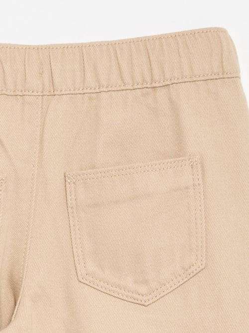 Calças wide leg - corte ajustado - Kiabi Calças wide leg - corte ajustado - Kiabi