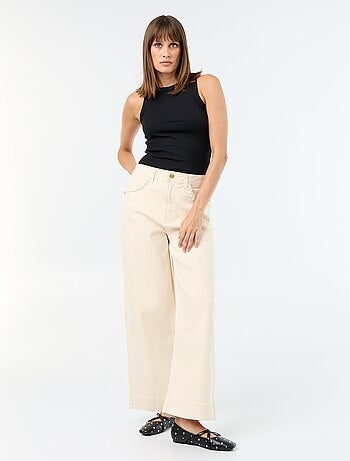 Calças wide leg com bolsos entrançados