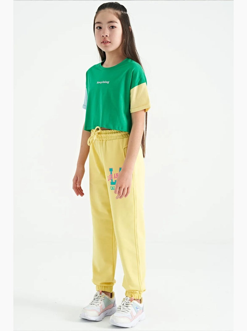 Calças youth em mistura de algodão tommy Amarelo-limão - Kiabi