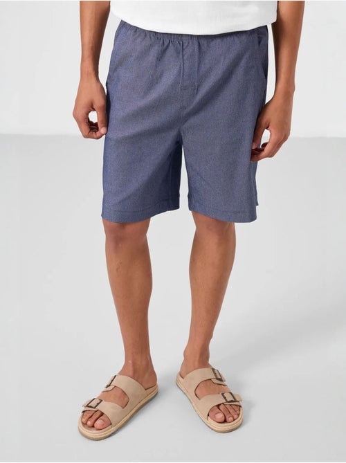 Calções chino de homem de corte regular tommy - Kiabi Calções chino de homem de corte regular tommy - Kiabi