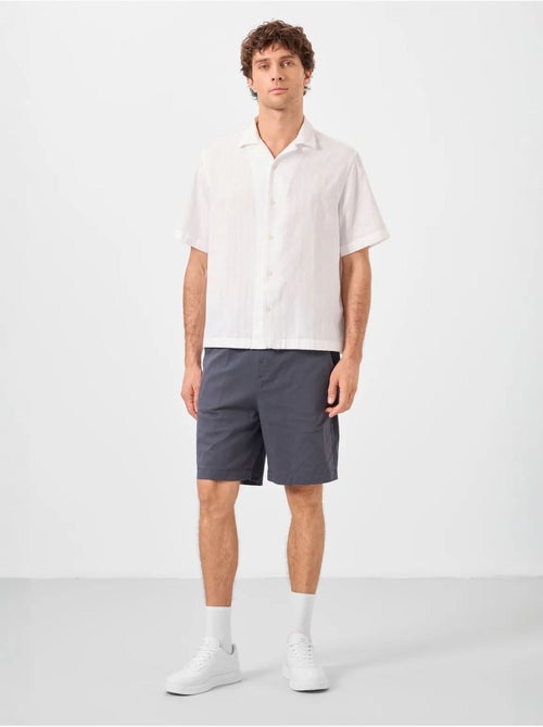 Calções chino de homem de corte regular tommy - Kiabi Calções chino de homem de corte regular tommy - Kiabi