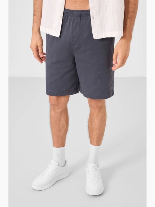 Calções chino de homem de corte regular tommy - Kiabi Calções chino de homem de corte regular tommy - Kiabi