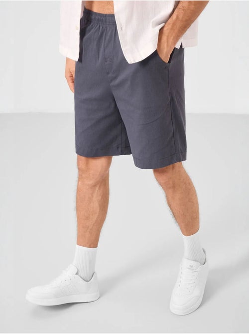 Calções chino de homem de corte regular tommy - Kiabi Calções chino de homem de corte regular tommy - Kiabi