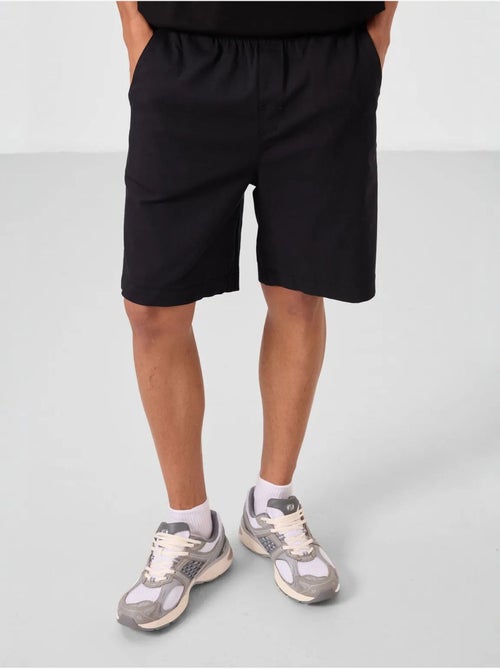 Calções chino de homem de corte regular tommy - Kiabi Calções chino de homem de corte regular tommy - Kiabi