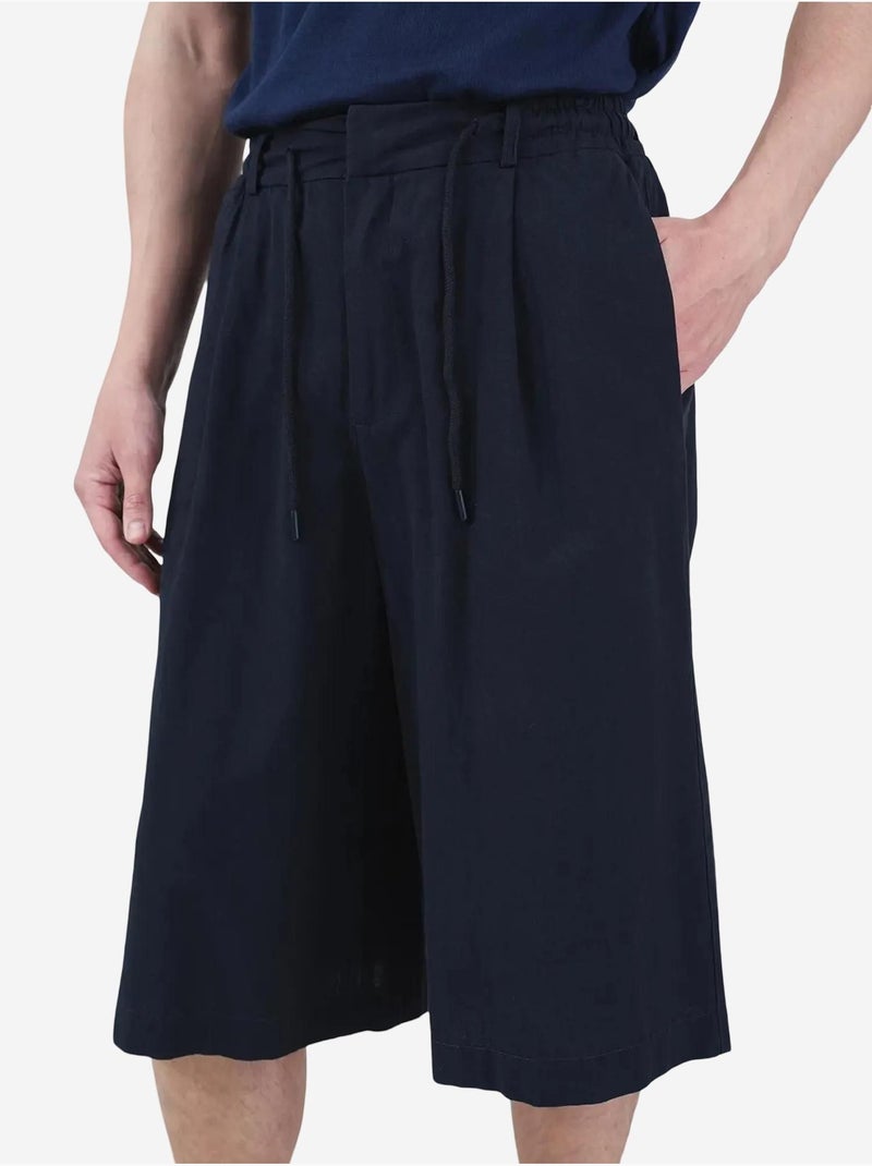 Calções compridos de perna larga estilo chino com cintura com cordão giesto Azul-marinho - Kiabi
