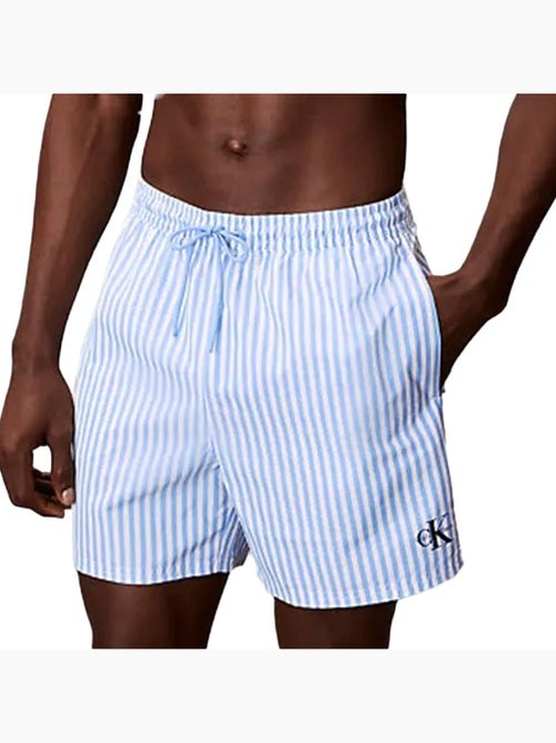 Calções de Banho Calvin Klein Jeans com Cordão Azul/Branco para Homem - Kiabi Calções de Banho Calvin Klein Jeans com Cordão Azul/Branco para Homem - Kiabi