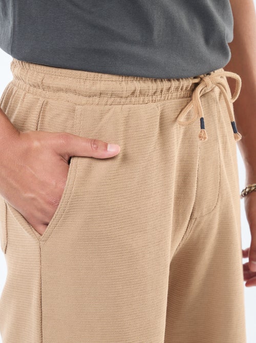 Calções de desporto com bolsos em malha de fantasia - Kiabi