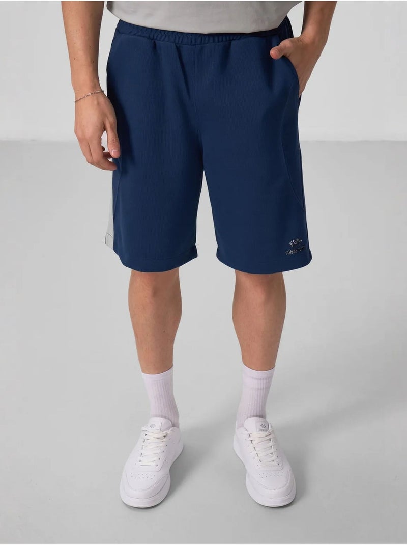 Calções de malha oversize em mistura de algodão tommy Azul-marinho - Kiabi