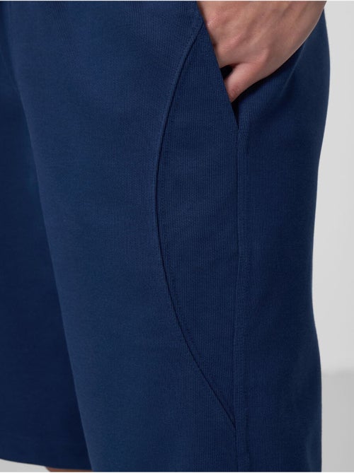 Calções de malha oversize em mistura de algodão tommy - Kiabi Calções de malha oversize em mistura de algodão tommy - Kiabi