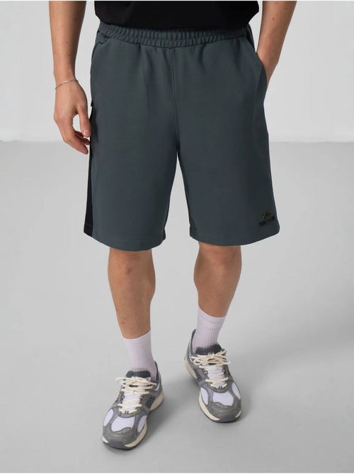 Calções de malha oversize em mistura de algodão tommy - Kiabi Calções de malha oversize em mistura de algodão tommy - Kiabi