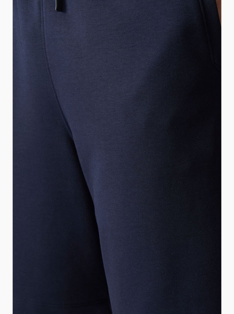 Calções de moletom masculinos em mistura de algodão tommy Azul-marinho - Kiabi