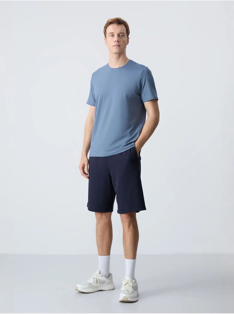 Calções de moletom masculinos em mistura de algodão tommy Azul-marinho - Kiabi