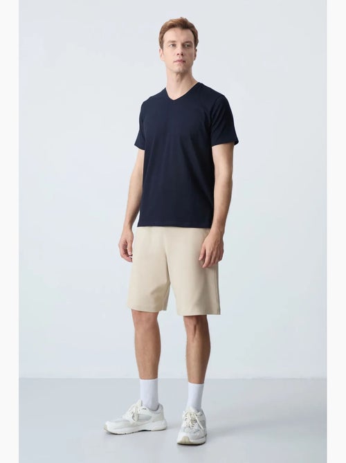 Calções de moletom masculinos em mistura de algodão tommy - Kiabi Calções de moletom masculinos em mistura de algodão tommy - Kiabi