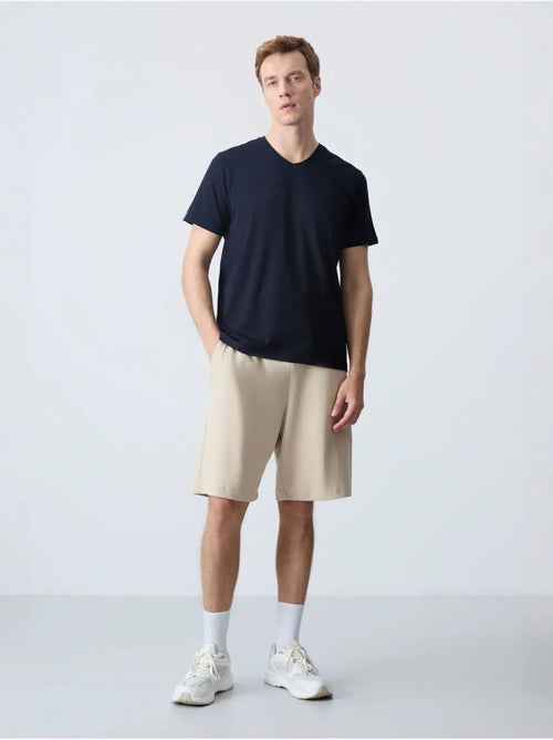 Calções de moletom masculinos em mistura de algodão tommy - Kiabi Calções de moletom masculinos em mistura de algodão tommy - Kiabi