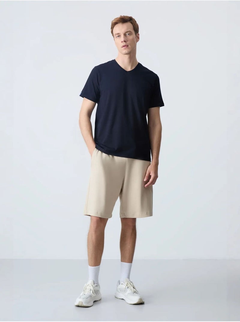 Calções de moletom masculinos em mistura de algodão tommy Bege-argila - Kiabi