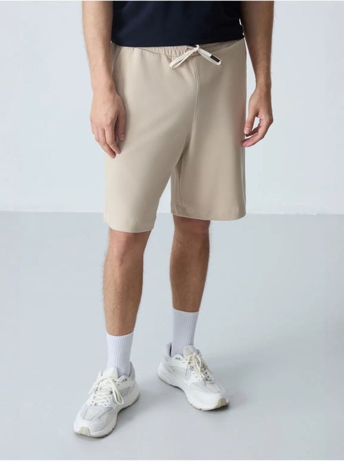 Calções de moletom masculinos em mistura de algodão tommy - Kiabi Calções de moletom masculinos em mistura de algodão tommy - Kiabi