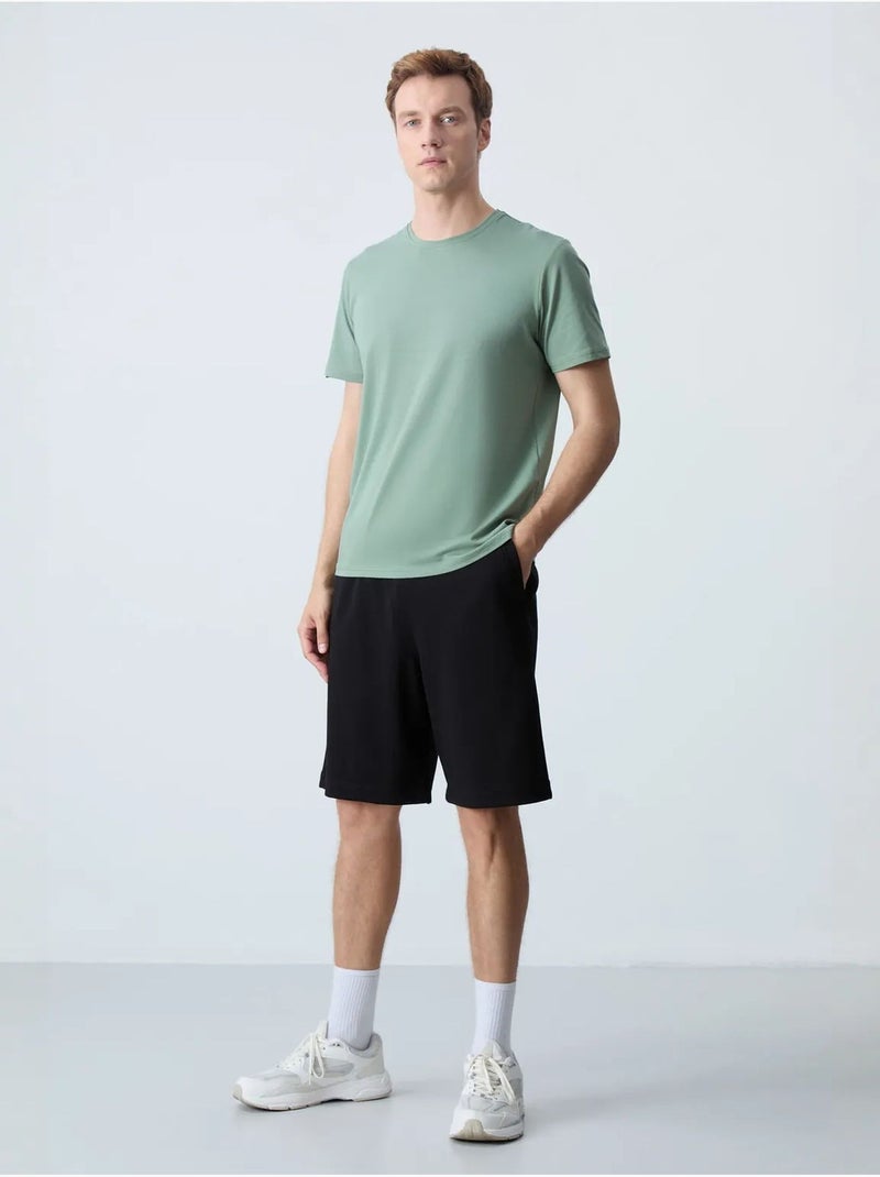 Calções de moletom masculinos em mistura de algodão tommy Preto - Kiabi