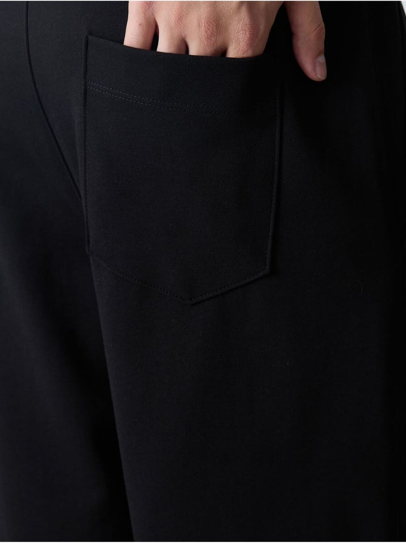 Calções de moletom masculinos em mistura de algodão tommy Preto - Kiabi