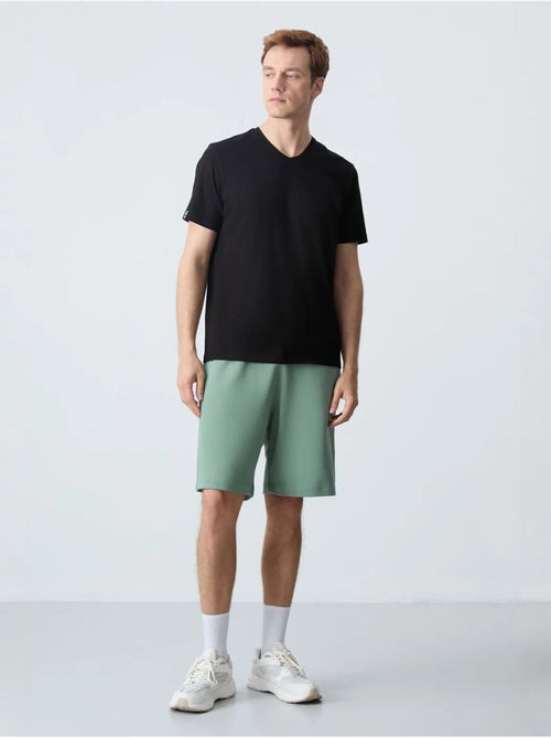 Calções de moletom masculinos em mistura de algodão tommy - Kiabi Calções de moletom masculinos em mistura de algodão tommy - Kiabi
