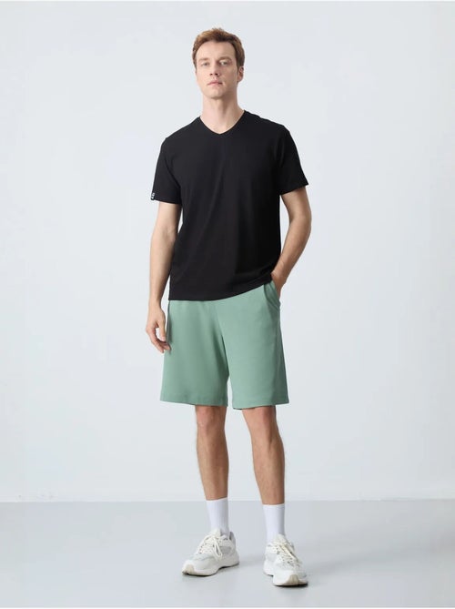 Calções de moletom masculinos em mistura de algodão tommy - Kiabi Calções de moletom masculinos em mistura de algodão tommy - Kiabi