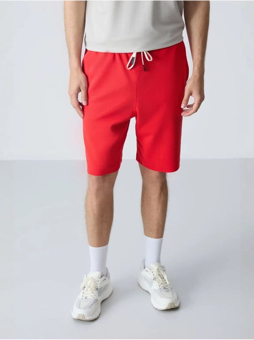 Calções de moletom masculinos em mistura de algodão tommy - Kiabi Calções de moletom masculinos em mistura de algodão tommy - Kiabi