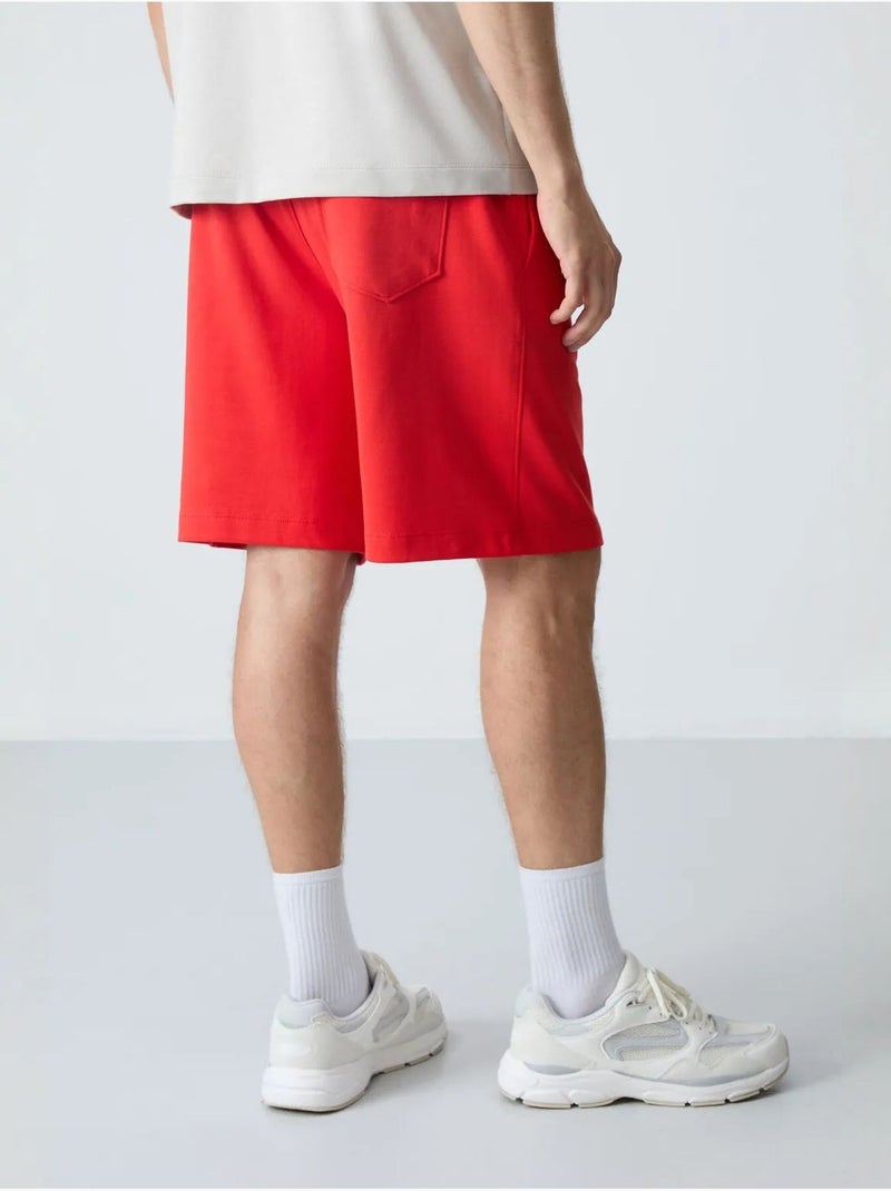 Calções de moletom masculinos em mistura de algodão tommy Vermelho - Kiabi