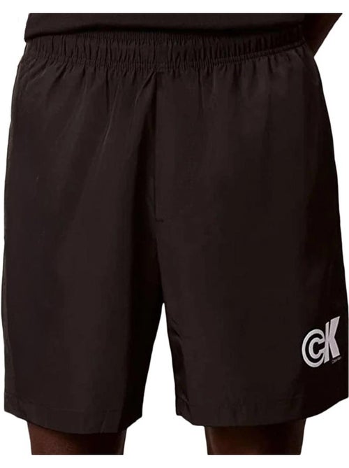 Calções de Nylon Pretos Calvin Klein Jeans com Logótipo e Cordão para Homem - Kiabi Calções de Nylon Pretos Calvin Klein Jeans com Logótipo e Cordão para Homem - Kiabi