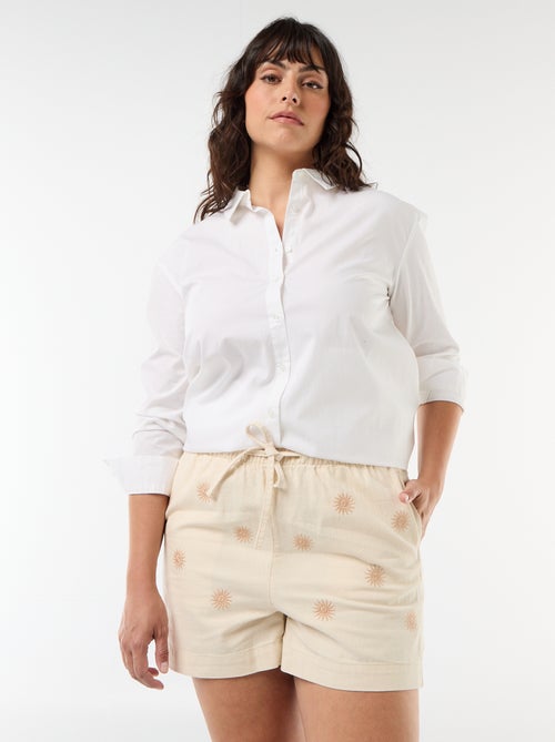 Calções em cor natural com bordados de sol - Kiabi